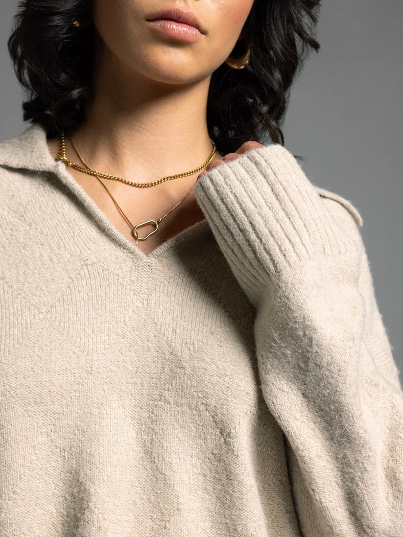 Prudence Sweater: Cream Cable Knit with Gold Heart Necklace