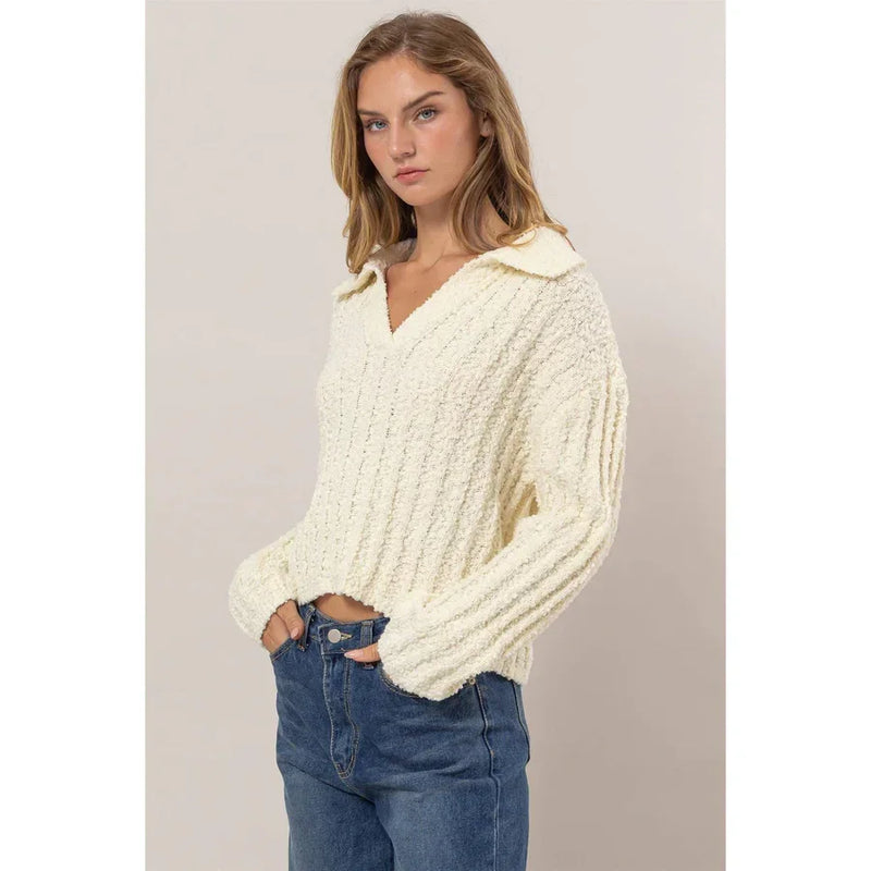 Cream-colored collared sweater with quarter-zip, perfect for women’s boho chic clothing