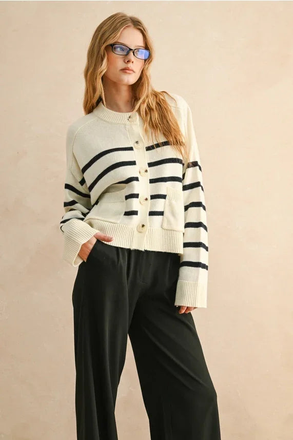 Cream-colored stripe pattern button front cardigan with black stripes