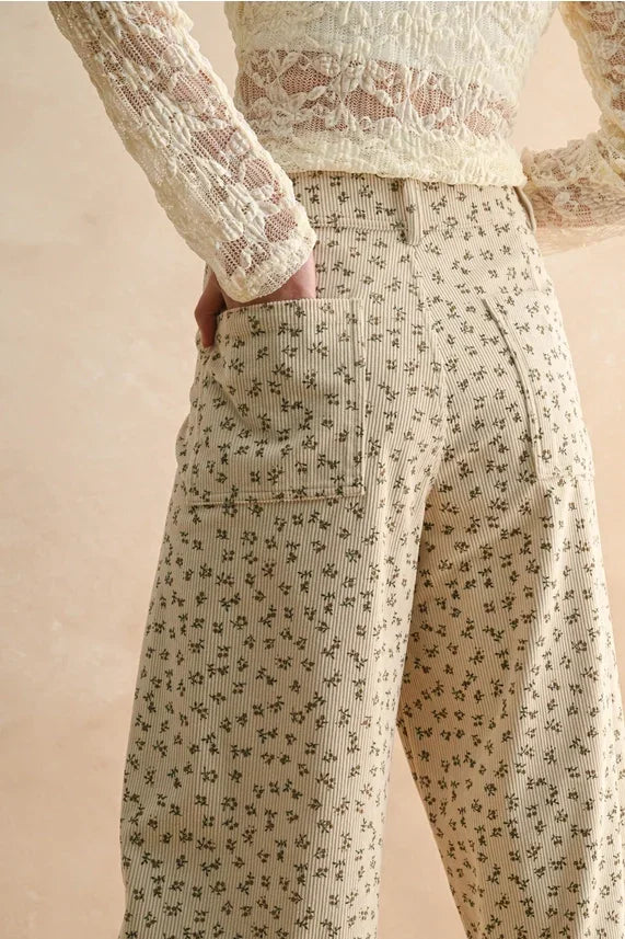 Cream-colored floral printed corduroy wide-leg pants for a stylish casual look