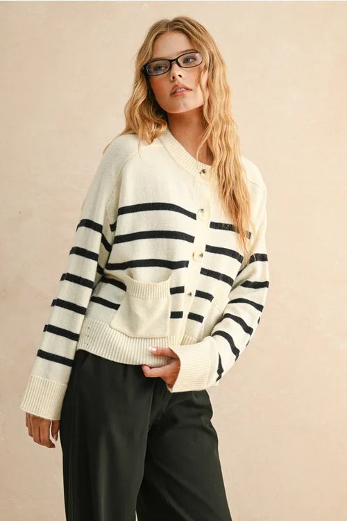 Cream-colored knit stripe pattern button front cardigan with black stripes