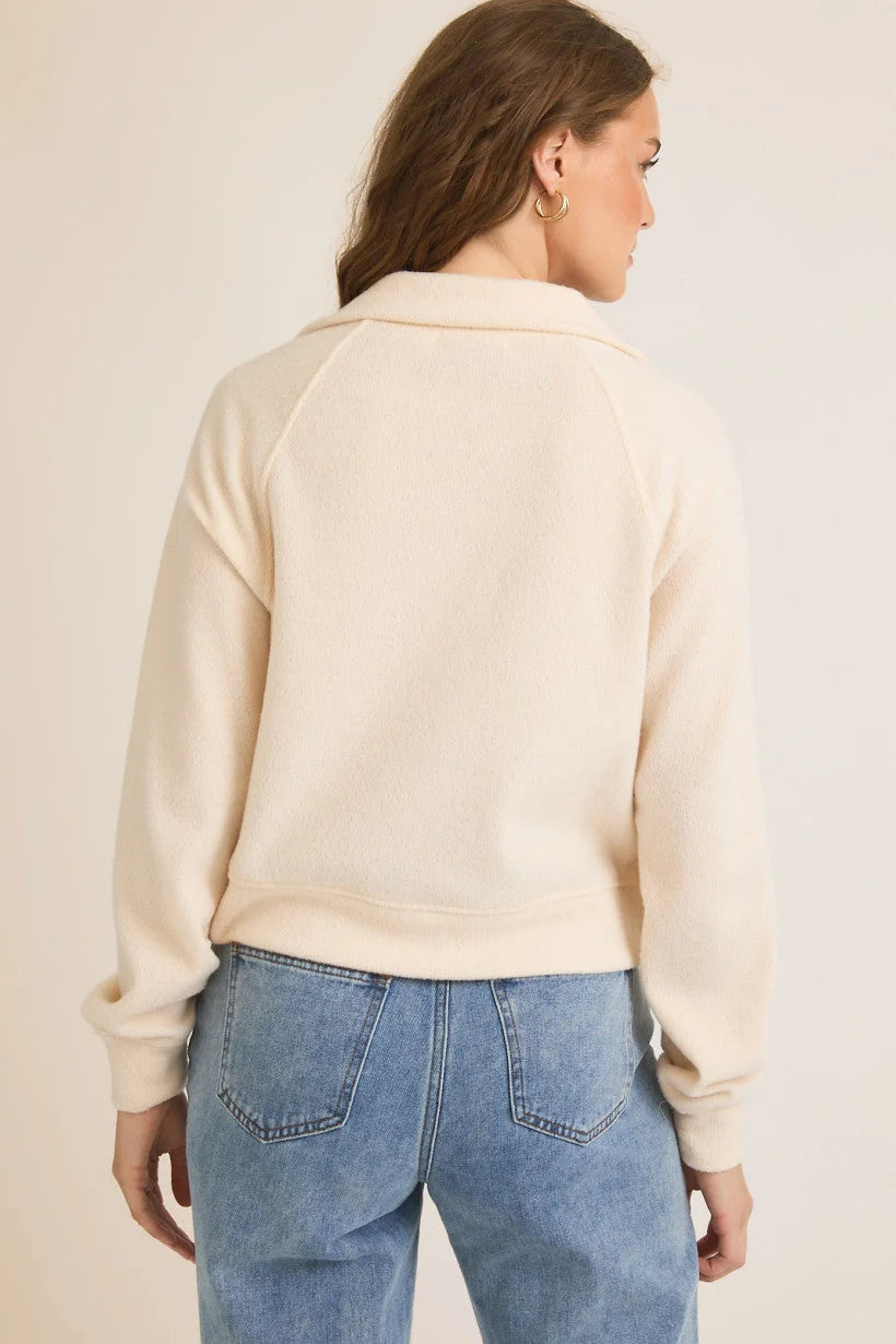 Cream-colored knit sweater with collar, size small, from Shop Daisy’s women’s boho chic clothing