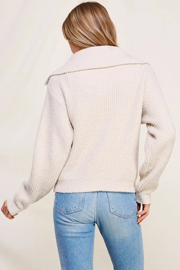 Cream-colored knit sweater with wide collar, showcasing the Soft Plush Half Zip Pullover