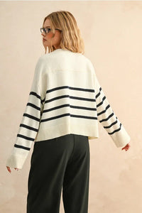 Cream-colored stripe pattern button front cardigan with black stripes