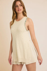 Cream-colored round neck sleeveless knit tank top and shorts set with side open stitch detail