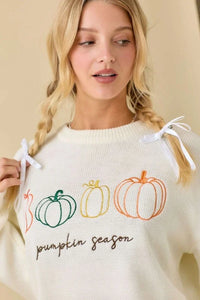 Cream-colored pumpkin embroidered sweater with embroidered pumpkins and Pumpkin Season text