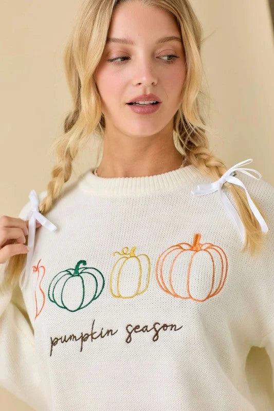 Cream-colored pumpkin embroidered sweater with embroidered pumpkins and Pumpkin Season text