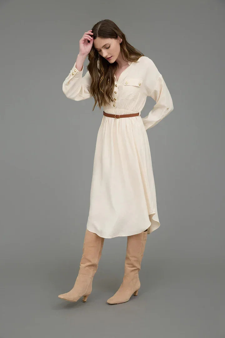 Cream-colored midi dress with half button design and brown belt, ideal for women’s boho chic clothing