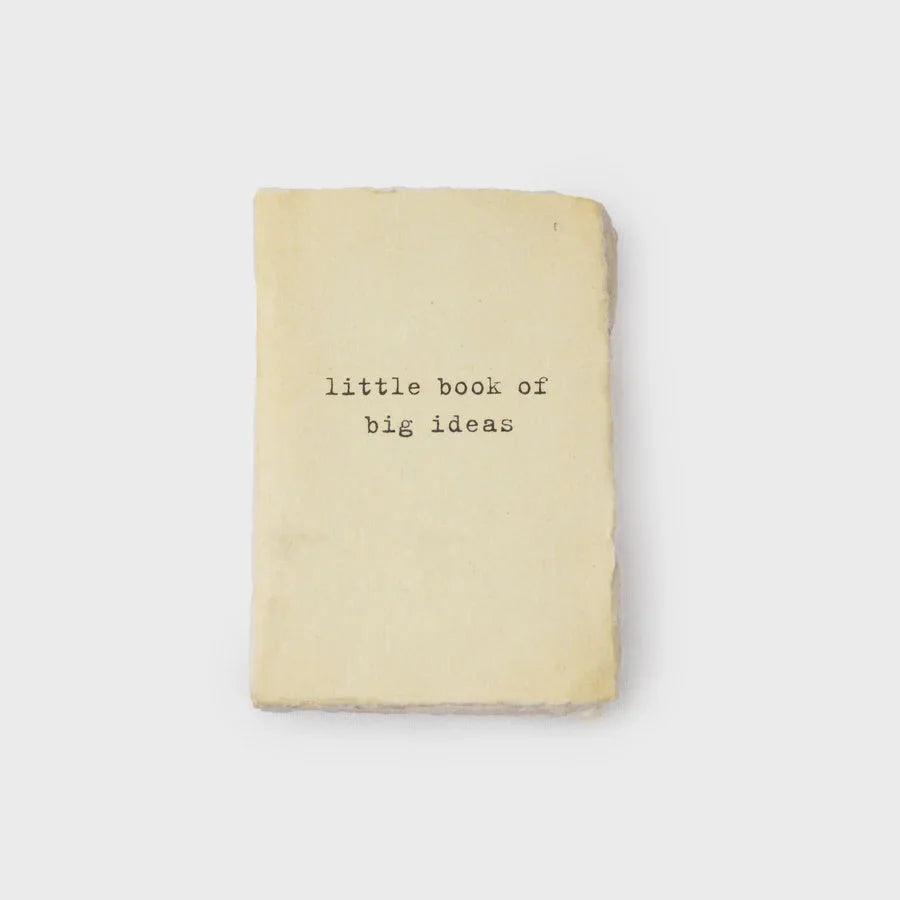 Cream-colored notebook with Little Book of Big Ideas cover design in boho style