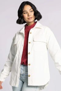 Cream-colored oversized Thread and Supply Dallas Jacket with gold buttons and frayed hem