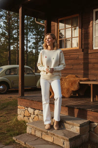 Cream-colored round neck long sleeve cotton sweater with red heart embroidery