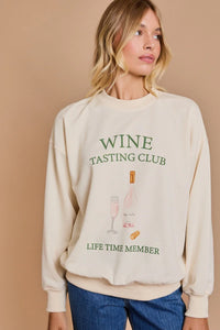 Cream-colored sweatshirt featuring Wine Tasting Club design for women’s boho chic clothing