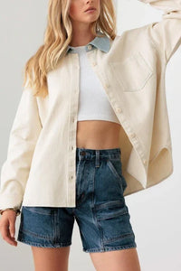 Cream-colored textured oversized shacket with a contrast collar, styled boho-chic