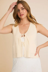 Cream-colored Front Tie Sweater Vest, a stylish tie sweater vest for elegant outfits