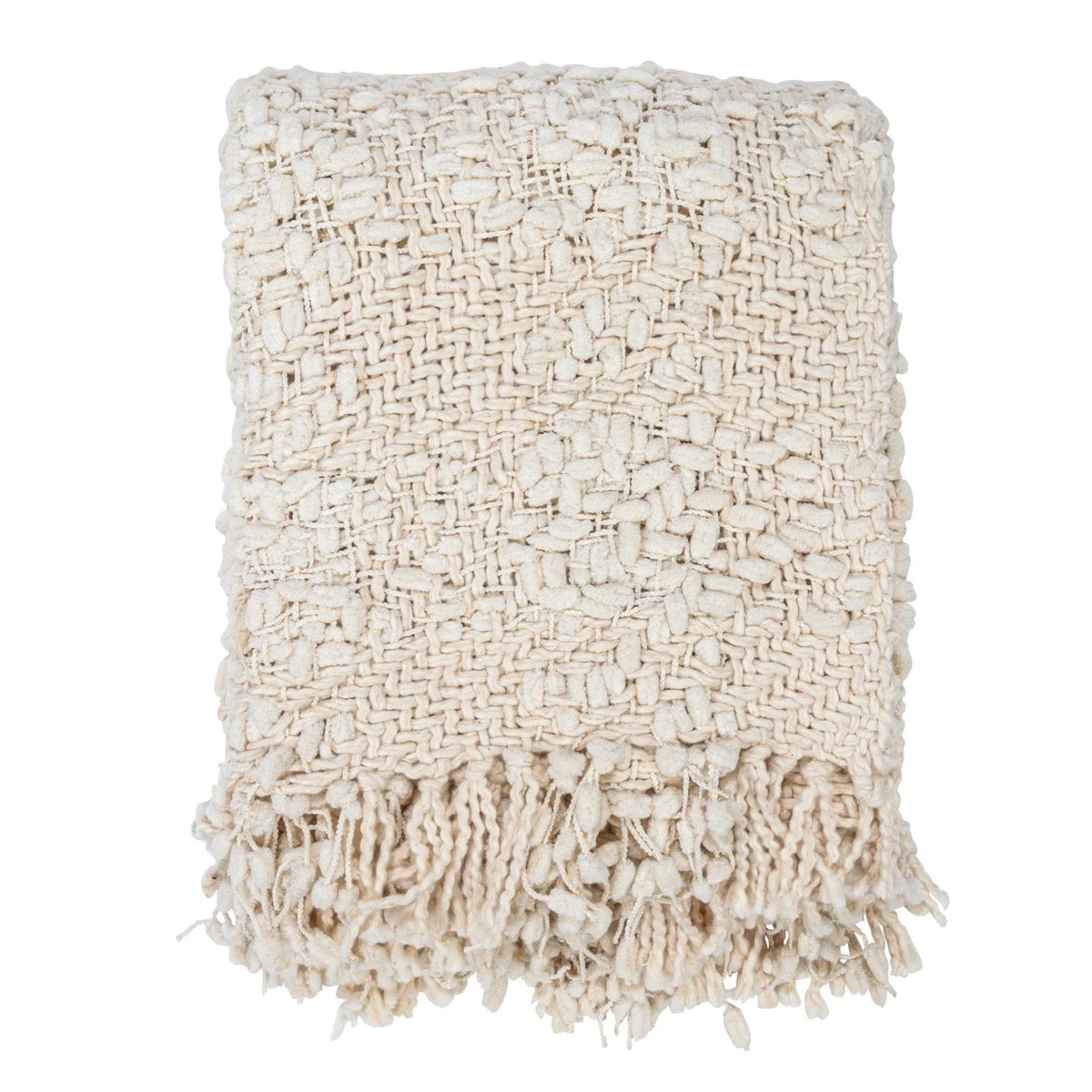 Cream-colored cable knit throw blanket with fringe tassels in woven cotton design