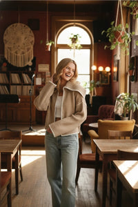 Stitch detailed sweater cardigan in cream shearling with fur collar
