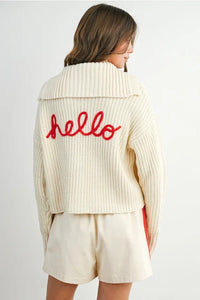 Cream oversized knit collared V-neck sweater with red hello embroidery