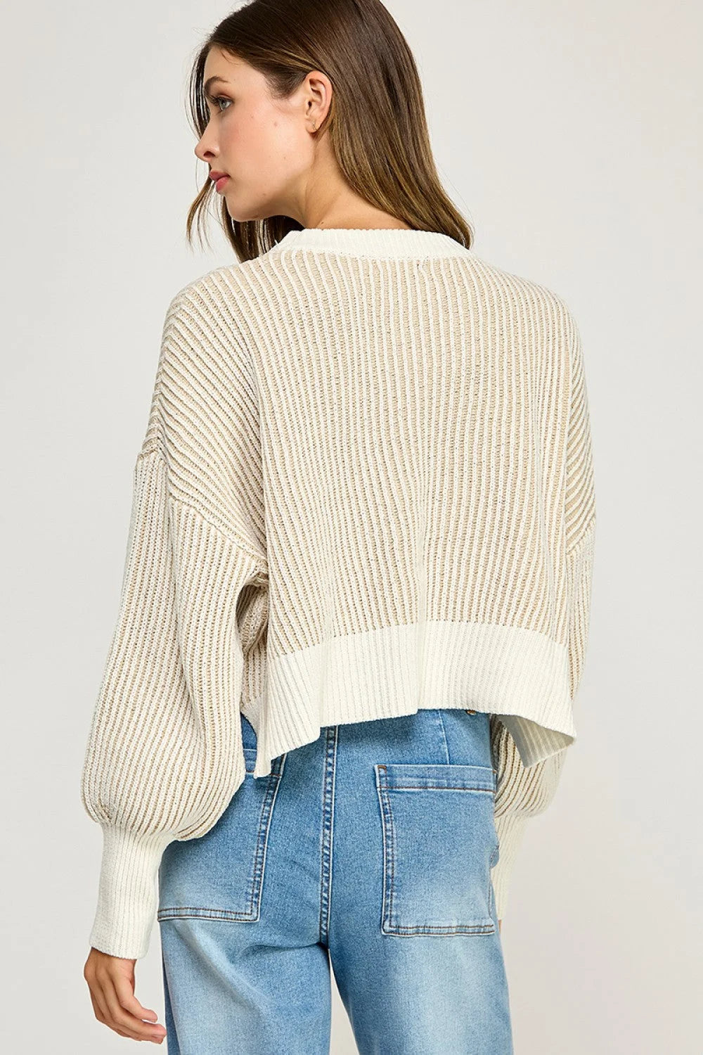 Cream and white ribbed knit balloon sleeve sweater