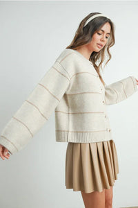Cream and white striped cardigan with button front and oversized sleeves