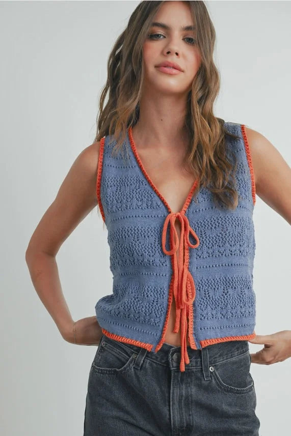 Crochet tie front vest with orange trim, ideal for women’s boho chic clothing, shop Daisy