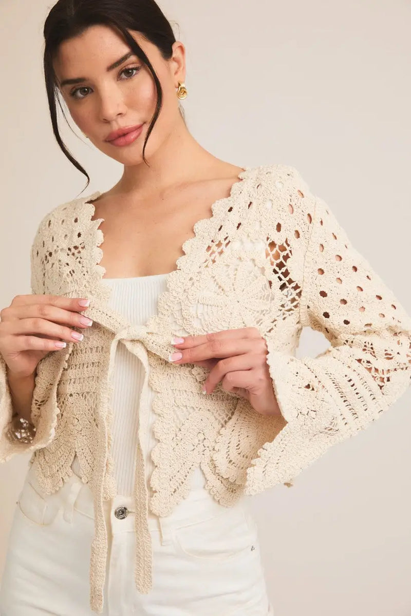 Crocheted ivory bolero jacket featured in a Bohemian Crochet Cardigan collection