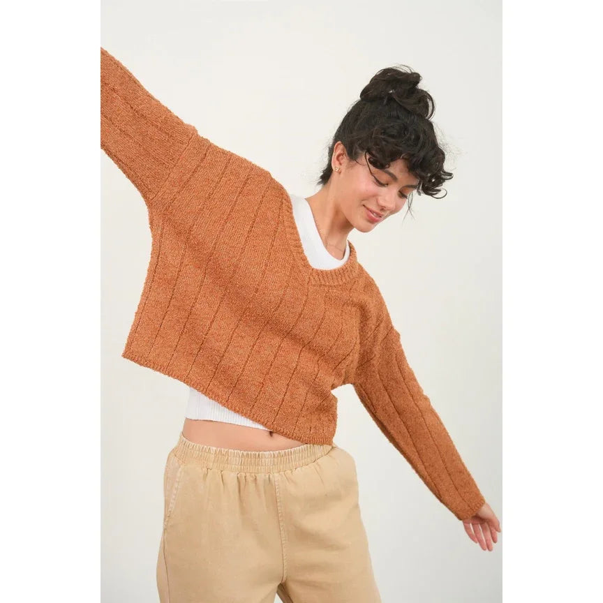 Cropped orange textured knit sweater with long sleeves and V-neck design