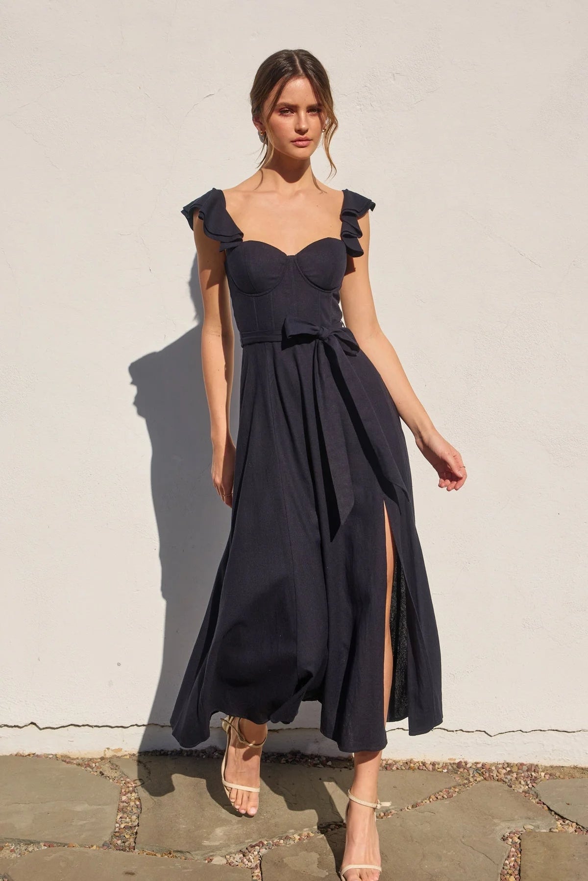 Dark blue HEAVEN SENT CORSET FLUTTER DRESS with sweetheart neckline and high side slit