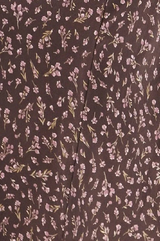 Dark brown short sleeve midi dress with floral pattern and self-cover button detail