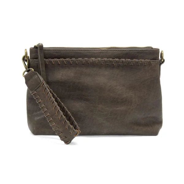 Dark brown vegan leather clutch with braided wristlet strap and decorative stitching