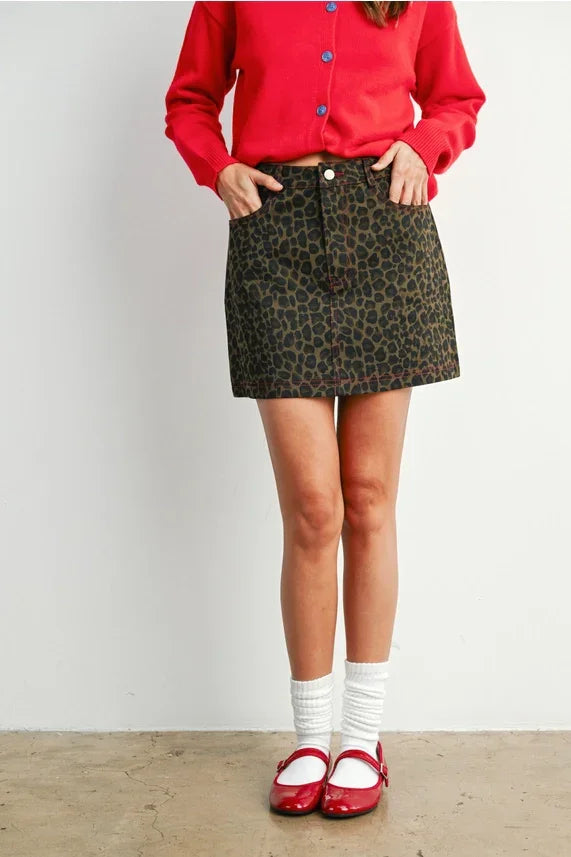 Dark green and black leopard print mini skirt from LEOPARD PRINT BUTTONED MINI SKIRT, perfect for women’s boho chic clothing