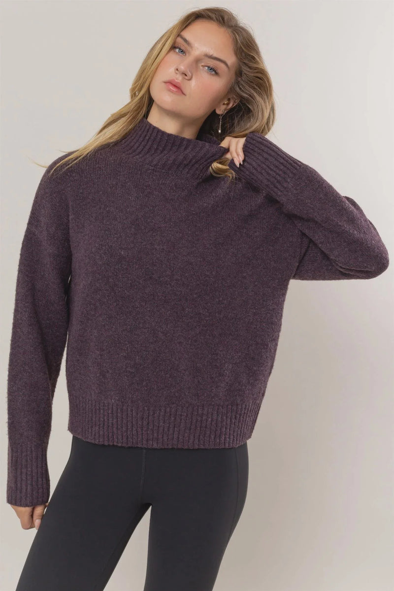 Dark purple high neck knit turtleneck sweater from Shop Daisy for women’s boho chic clothing