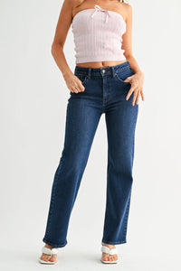 Mid rise straight leg denim jean in dark wash with high waist button fly