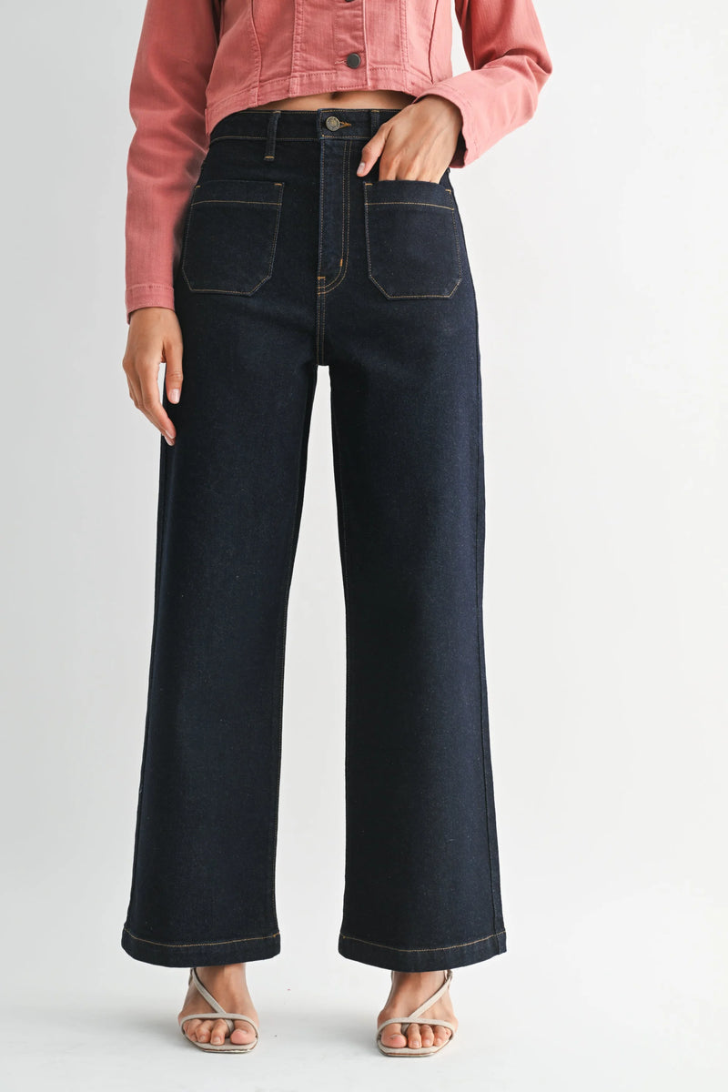 Dark wash wide-leg denim jeans with patch pockets and contrast stitching