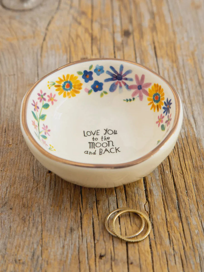 Decorative trinket bowl with floral border and Love You to the Moon inscription