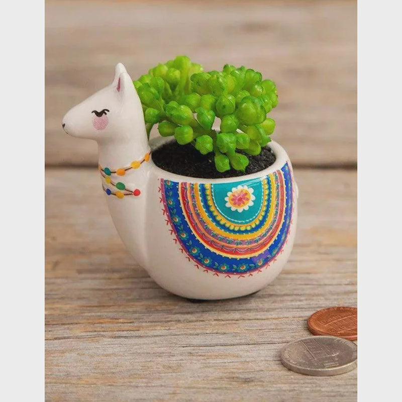 Hand painted decorative llama planter with colorful patterns and faux succulent