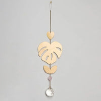 Decorative SUNCATCHERS GEMSTONE with wooden monstera leaf and crystal pendant, boho style