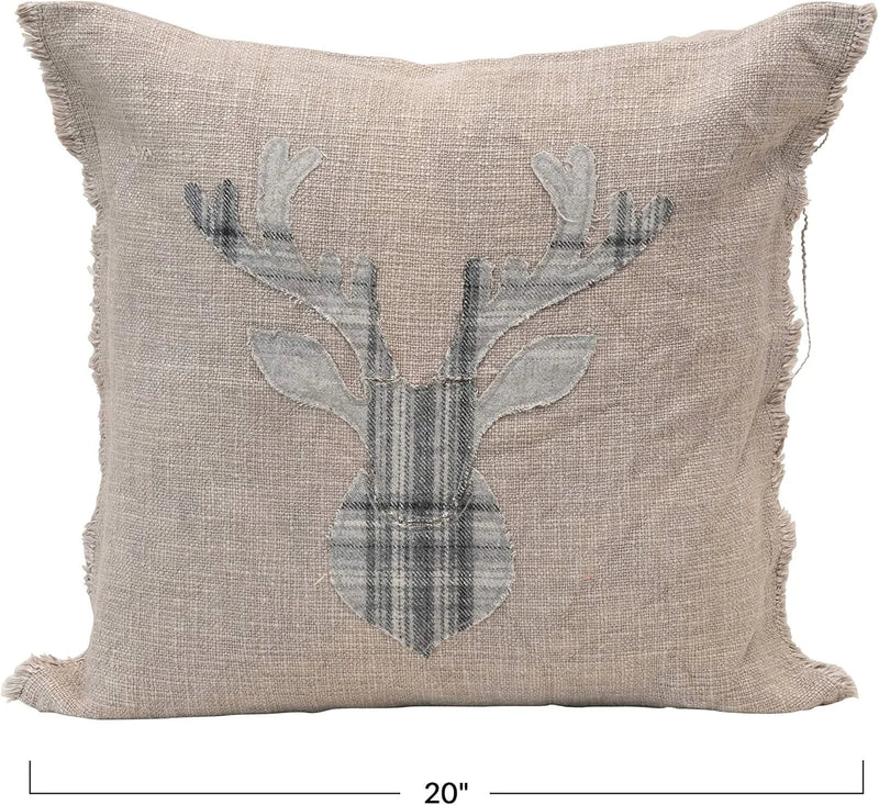 Decorative Christmas pillow featuring a plaid deer head silhouette on a frayed edge cushion