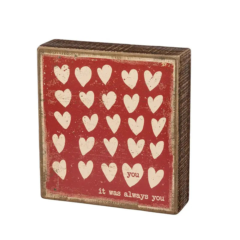 Decorative rustic wood box sign with white hearts and text reading it was always you