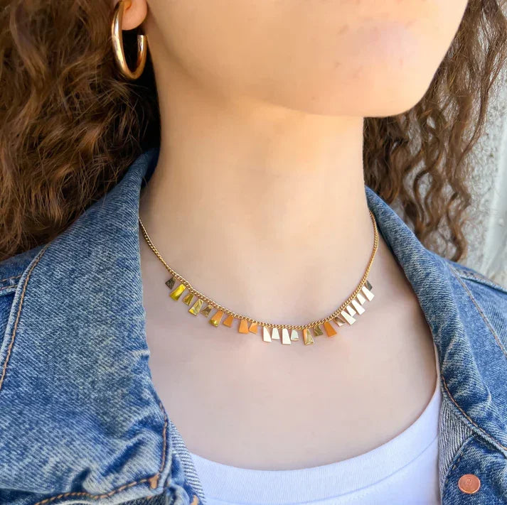 Water resistant tiny curb necklace with delicate gold chain and multicolored metallic charms