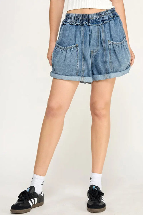 Denim ruffle-waist shorts featuring stylish balloon style pockets for versatile wear