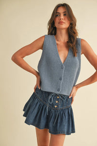 Denim ruffled mini skirt in sleeveless vest sweater style