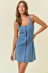 Denim zip-front dress with double scoop neck and adjustable buckle strap detailing