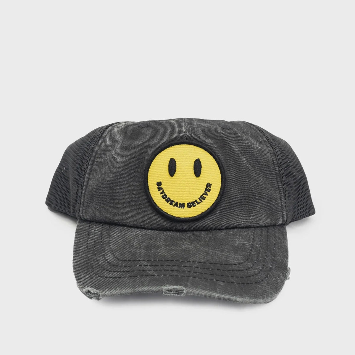 Distressed gray baseball cap with smiley face patch from Daydream Believer collection