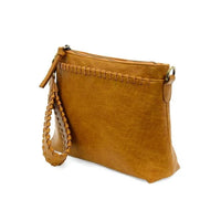 Distressed tan vegan leather clutch with braided accents and removable shoulder strap