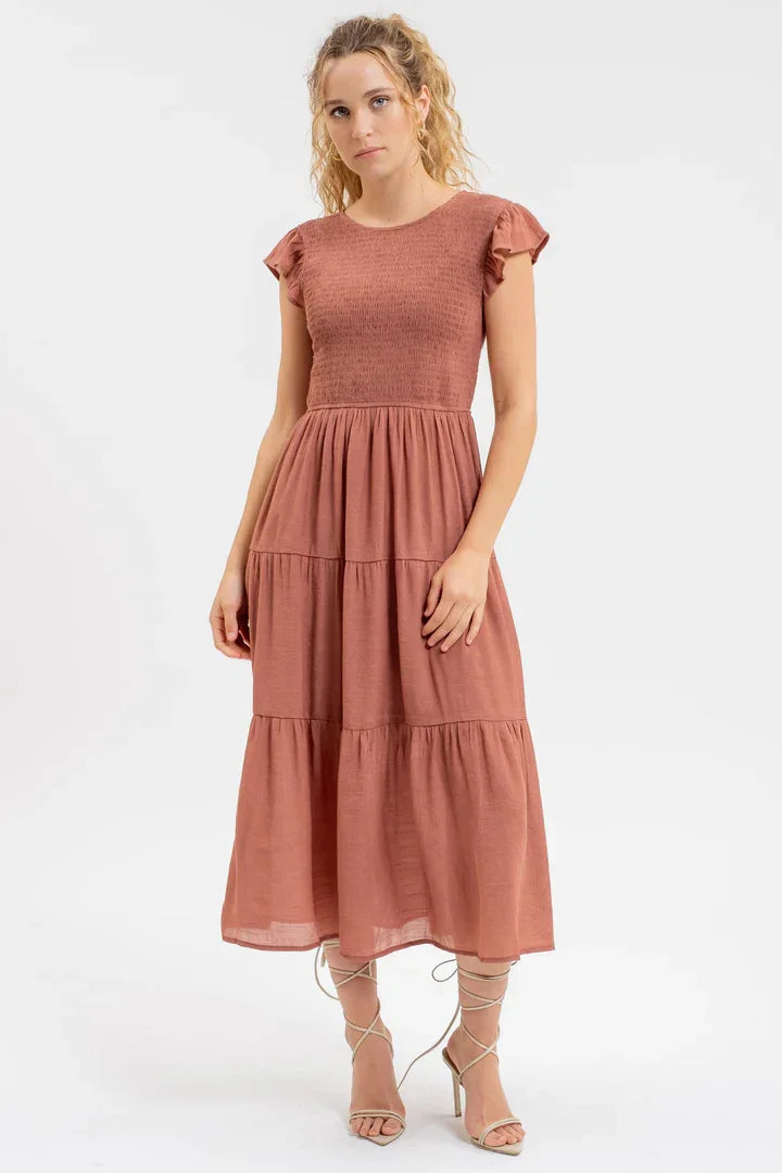 Dusty Rose Smocked Tiered Midi Dress with Ruffled Cap Sleeves and Gathered Waist