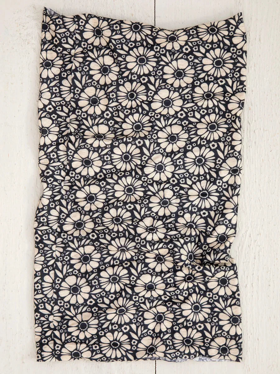 Fabric swatch featuring black and white daisies for Boho Bandeau Headband