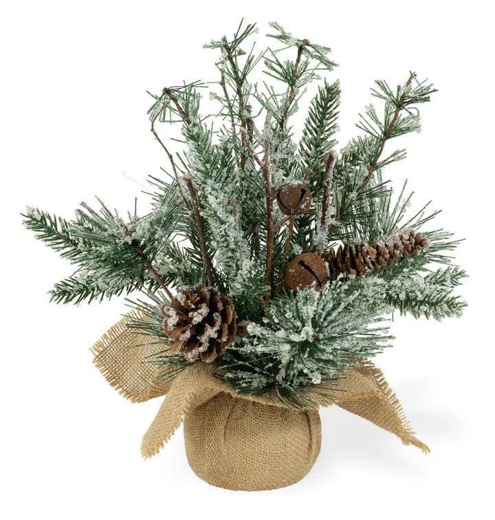 Festive winter arrangement featuring Frosted Jingle Tree with faux pine and pinecones