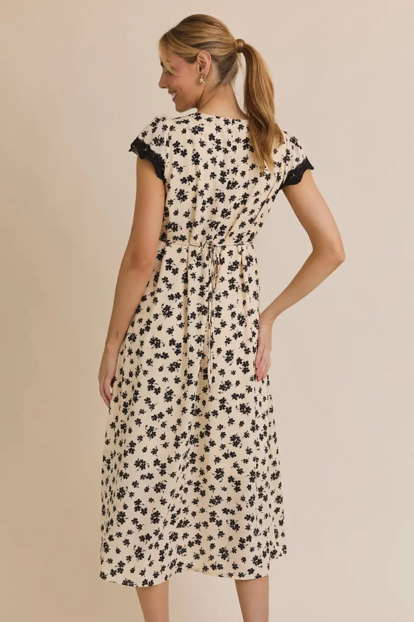 Floral midi dress with short sleeve lace trim and V-neck for elegant summer wear