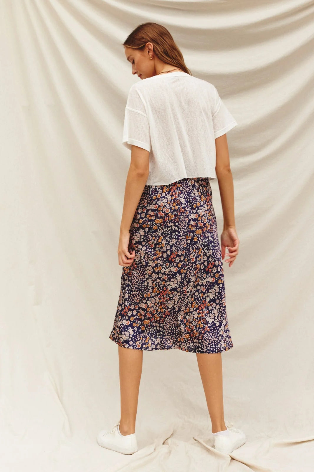 Floral A-Line Midi-Maxi Skirt styled with a white t-shirt and sneakers for a boho look