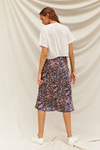 Floral A-Line Midi-Maxi Skirt styled with a white t-shirt and sneakers for a boho look